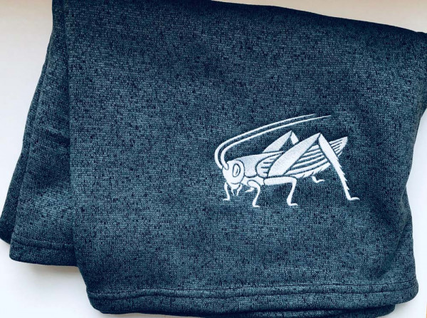 Fleecedecke mit Heugümper-Logo